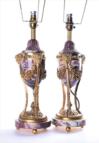 Lot 130 - A pair of Louis XVI style marble and ormolu...