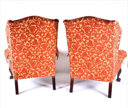 Lot 84 - A pair of George Smith wingback armchairs...