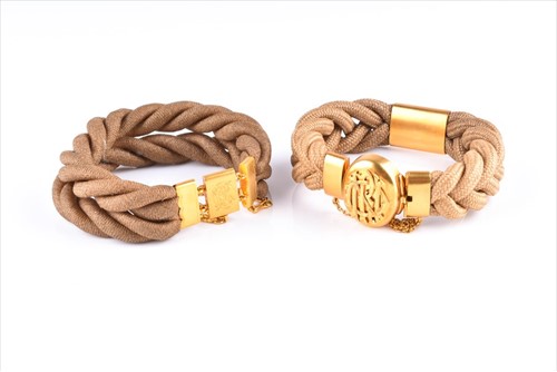 Lot 517 - Two Victorian hair bracelets with gold...