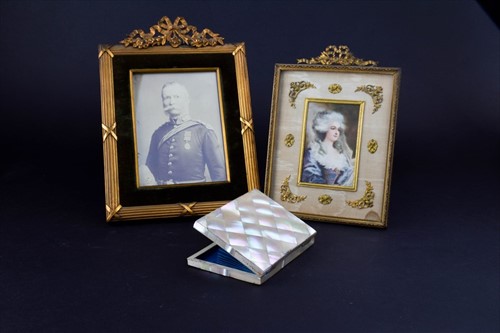 Lot 296 - Two late 19th century French gilt metal frames...