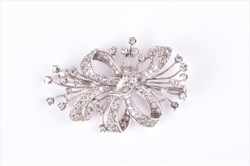 Lot 509 - A mid 20th century platinum and diamond floral...