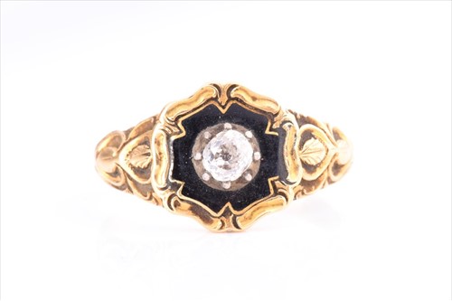 Lot 508 - A yellow metal and enamel mourning ring...