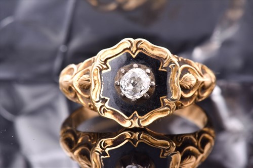 Lot 508 - A yellow metal and enamel mourning ring...