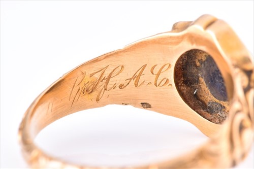 Lot 508 - A yellow metal and enamel mourning ring...