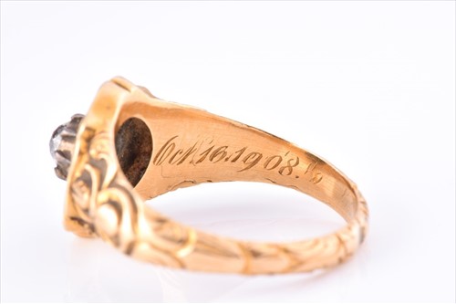 Lot 508 - A yellow metal and enamel mourning ring...