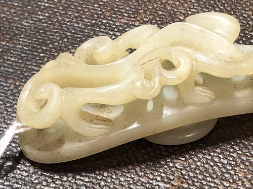 Lot 120 - Two Chinese celadon jade belt buckles each...