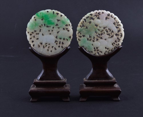 Lot 118 - Two Chinese carved and pierced jade...