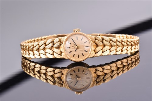 Lot 504 - Omega. A ladies 18ct yellow gold wristwatch...