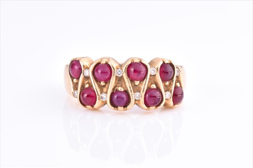 Lot 471 - An 18ct yellow gold, diamond, and ruby ring...