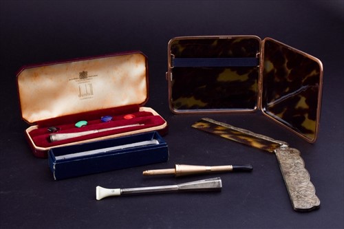 Lot 239 - A Dunhill silver cigarette holder and other...