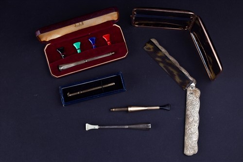 Lot 239 - A Dunhill silver cigarette holder and other...