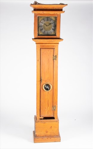 Lot 299 - A 19th century pine longcase clock the brass...