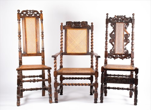Lot 77 - Two 17th century style carved oak side chairs...