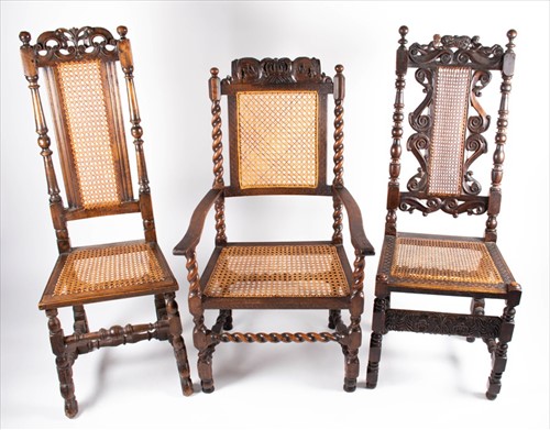 Lot 77 - Two 17th century style carved oak side chairs...