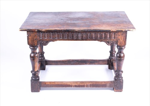 Lot 118 - An 18th century oak refectory style dining...