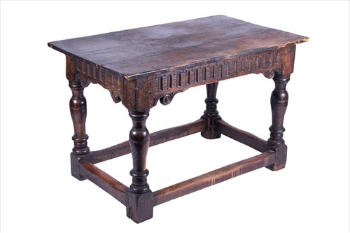 Lot 118 - An 18th century oak refectory style dining...