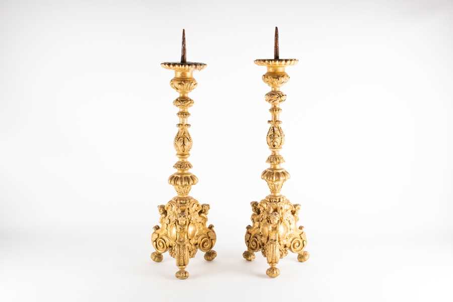 Lot 213 - A pair of 19th century giltwood pricket...