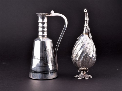 Lot 388 - A Niello white metal jug with Nile decoration...