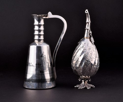 Lot 388 - A Niello white metal jug with Nile decoration...