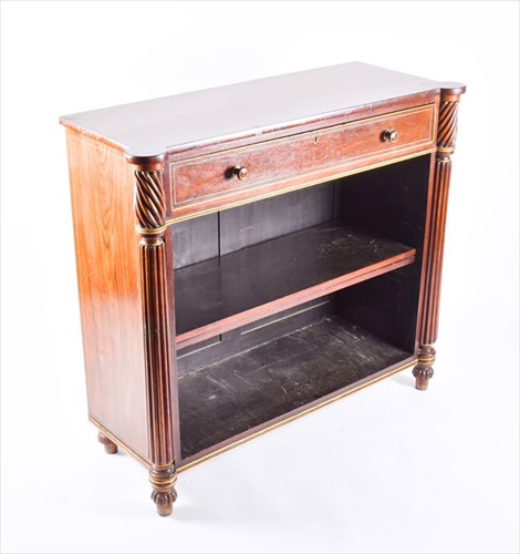 Lot 92 - A small Regency rosewood open bookcase with...