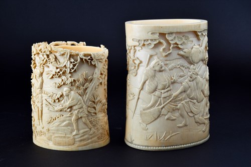 Lot 159 - A Meiji period ivory brush pot carved...