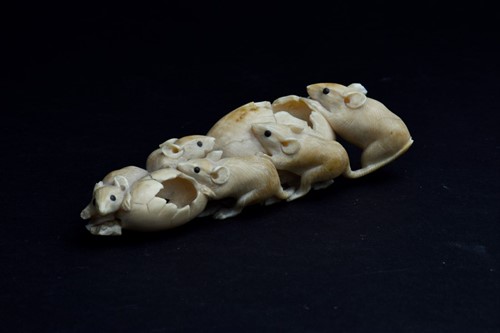 Lot 161 - A Japanese Meiji period ivory okimono modelled...