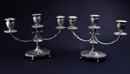 Lot 400 - A pair of Continental silver candelabra...