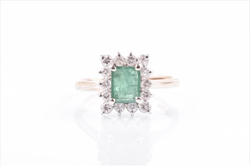 Lot 590 - A yellow metal, diamond, and emerald cluster...