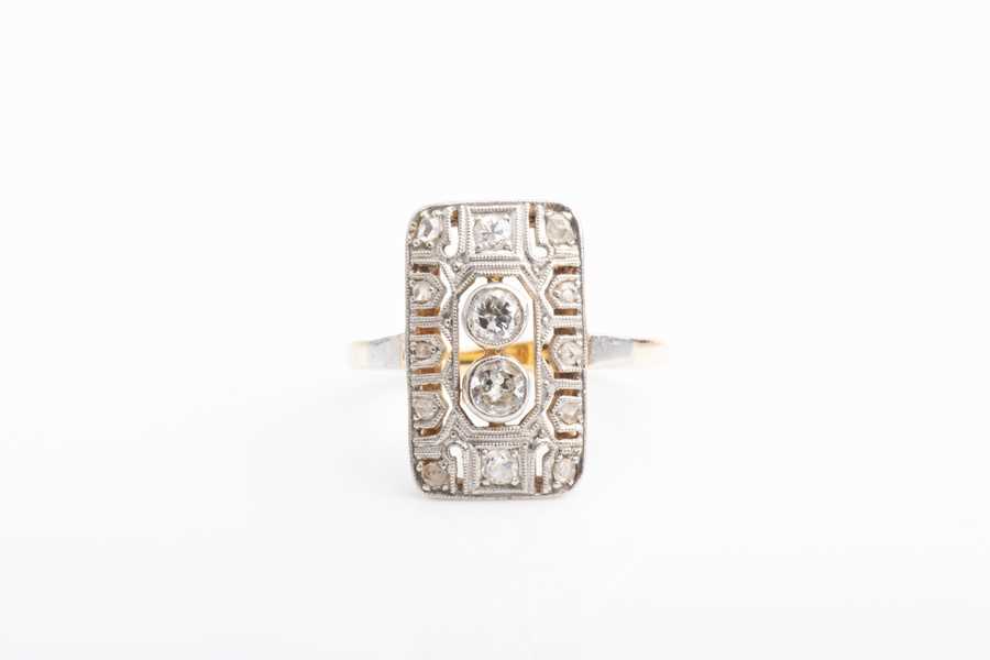 Lot 592 - A diamond plaque ring in the Art Deco taste,...