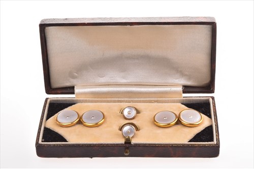 Lot 595 - A pair of yellow metal and mother-of-pearl...