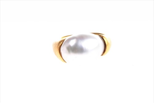 Lot 596 - A yellow metal and pearl cocktail ring of...