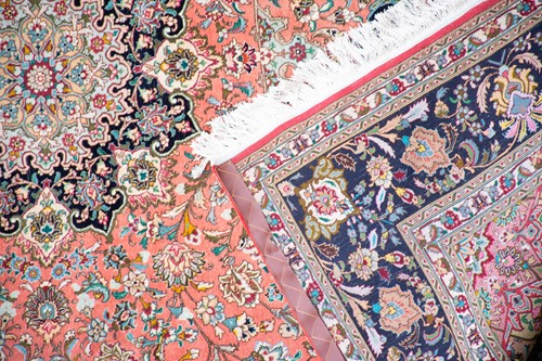 Lot 151 - A large 20th century hand woven Persian carpet...