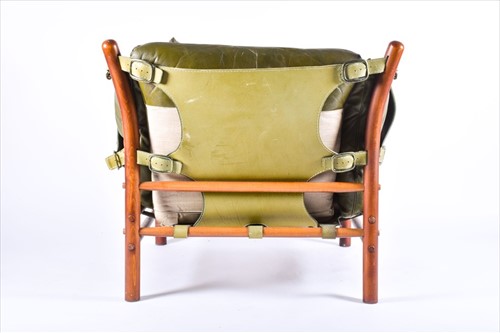 Lot 96 - A green leather upholstered chair and...