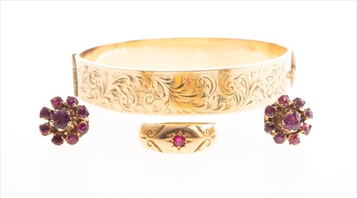 Lot 473 - A pair of 9ct yellow gold and ruby cluster...