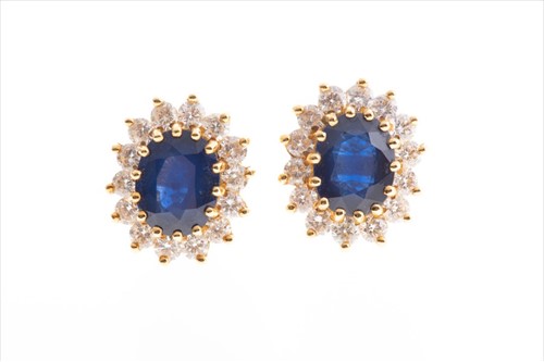 Lot 571 - A pair of 18ct yellow gold, diamond, and...