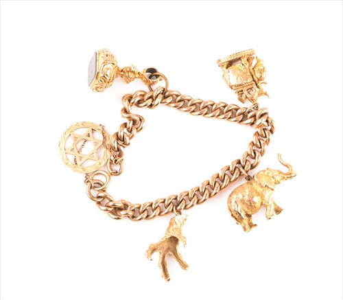 Lot 611 - A 9ct rose gold curb-link bracelet suspended...