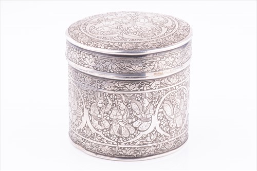 Lot 391 - A Persian white metal tea caddy of circular...