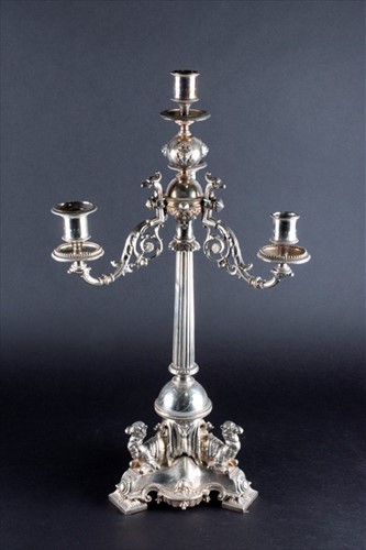 Lot 376 - A Victorian silver-plated three branch...