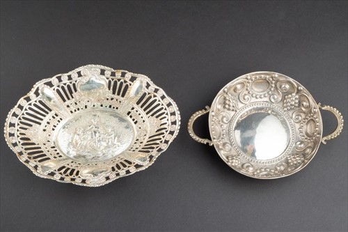 Lot 323 - A Continental white metal dish of pierced oval...