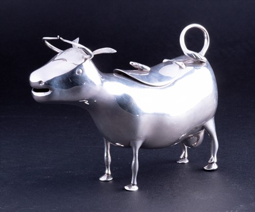 Lot 387 - An early 20th century Dutch silver cow creamer...