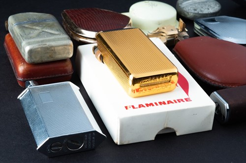 Lot 146 - A group of 1930s-70s cigarette lighters,...