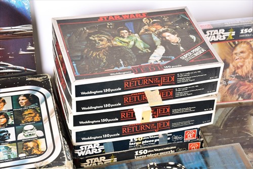 Lot 297 - A group of vintage 1980s Star Wars jigsaw...