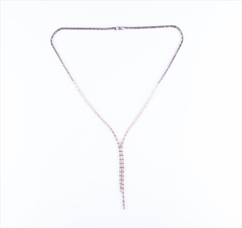 Lot 522 - An 18ct white gold and diamond necklace the...