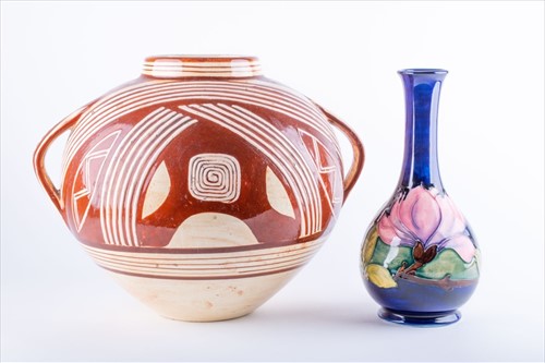 Lot 107 - A mid-20th century ceramic spherical vase in...