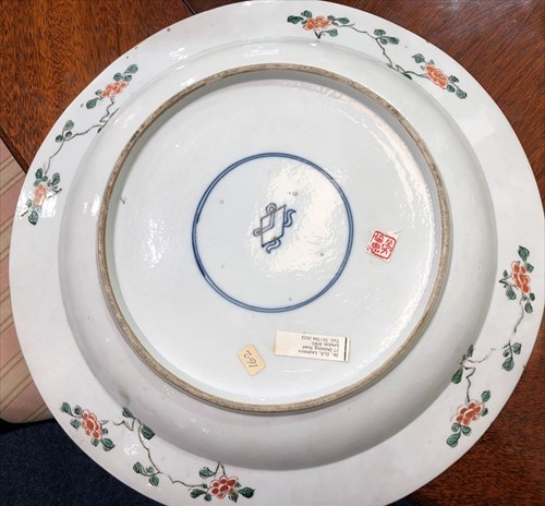 Lot 199 - A large Chinese-style famille verte charger of...