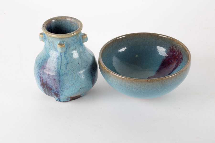 Lot 140 - A Jun ware purple splash stoneware tea bowl...