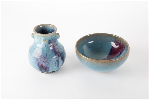 Lot 140 - A Jun ware purple splash stoneware tea bowl...