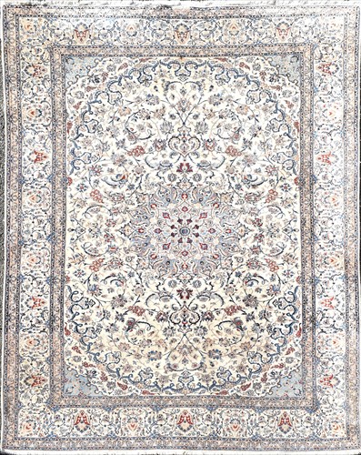 Lot 60 - A Persian ivory ground silk and wool Isfahan...