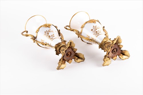 Lot 220 - A pair of 19th century ormolu mounted opaline...