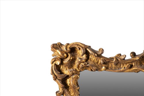 Lot 115 - A 19th century carved giltwood framed mirror...